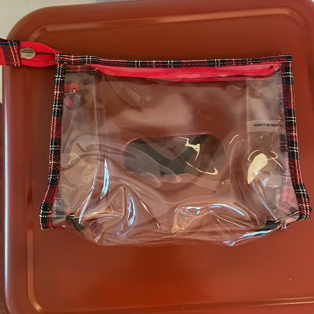 Cute puppy purse w/ coin purse and clear clutch included.